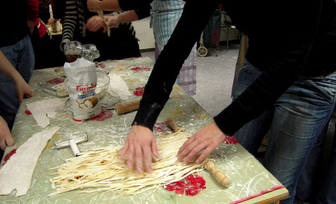 Students preparing pasta